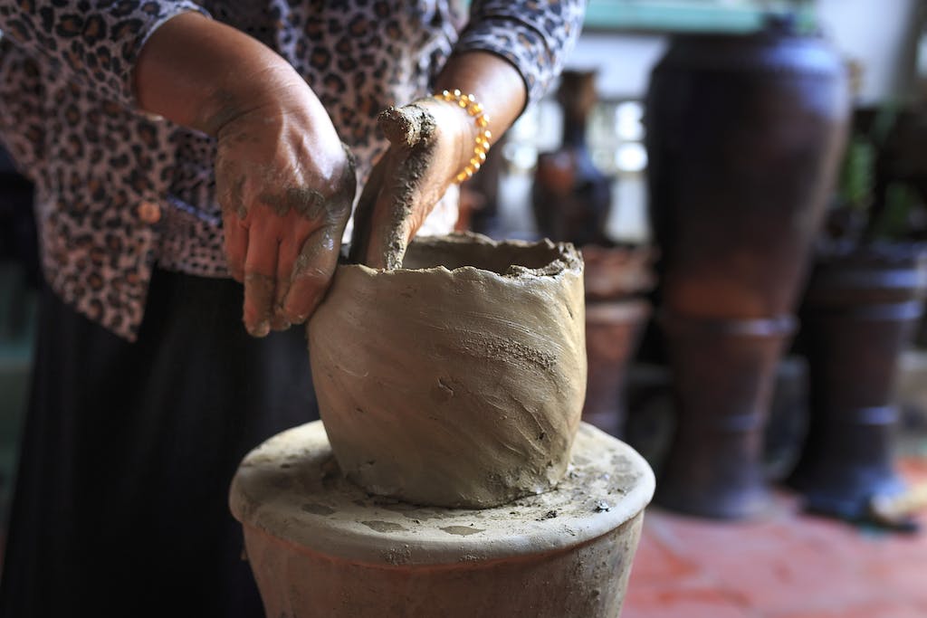 Person Molding Clay Pot